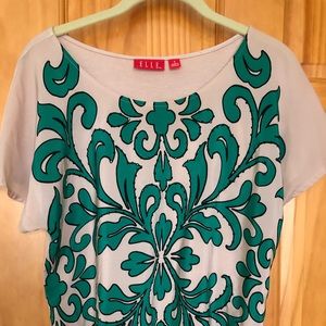 Womens blouse, green/ black pattern in front with sequins, back is tan color